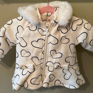 Off white jacket with black hearts